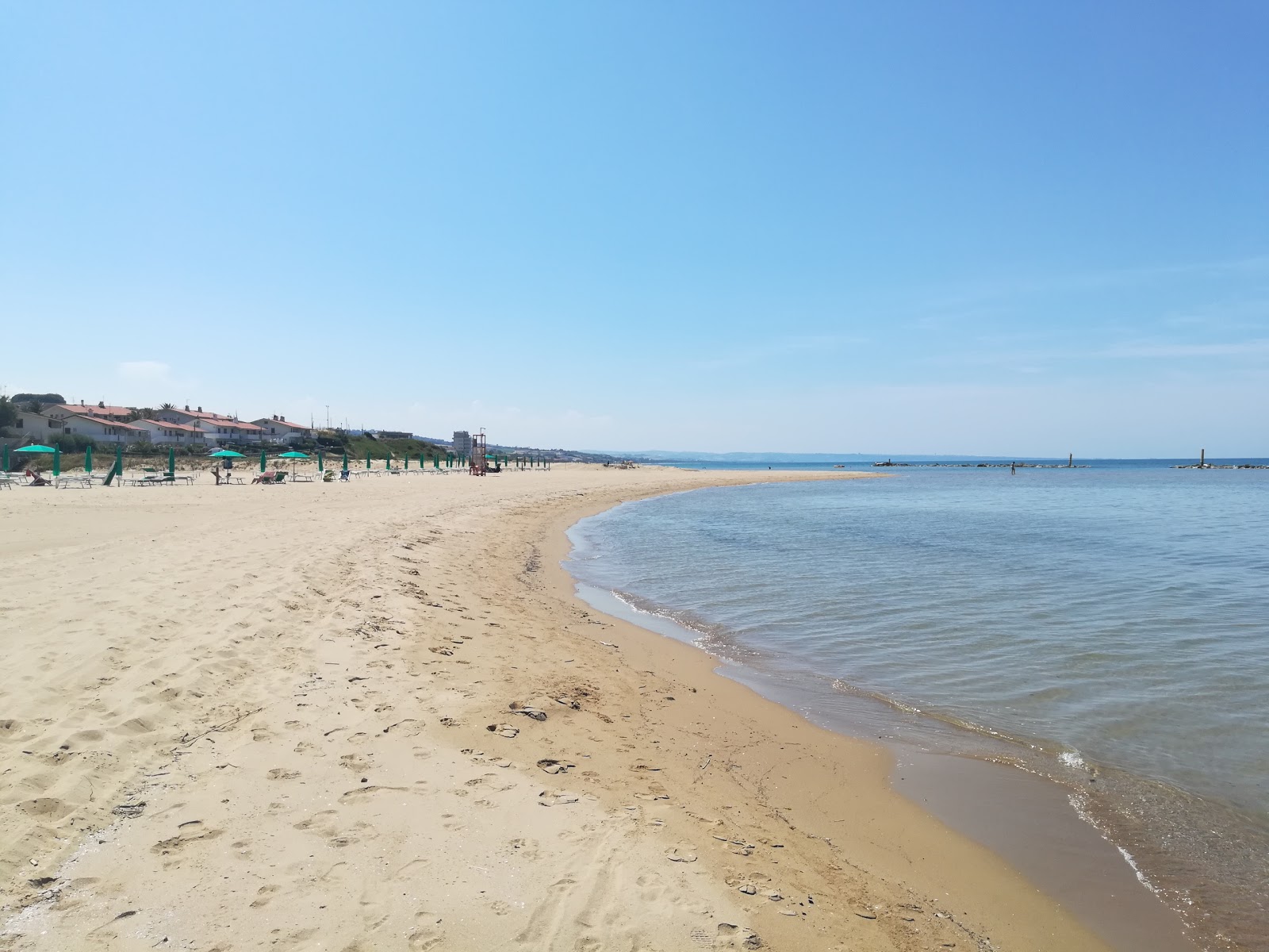 Foto di Spiaggia del Litorale Nord con una superficie del sabbia beige fine