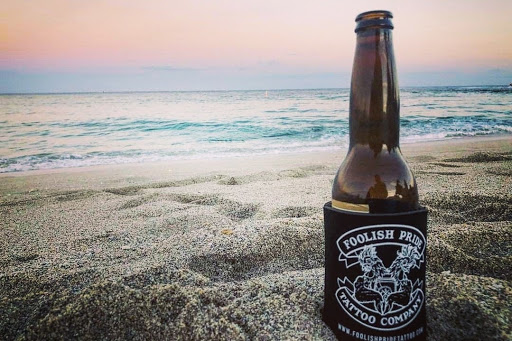 Explore flag tattoo ideas, creative tattoo ideas in Clearwater, available at Foolish Pride 2 Tattoo Co.