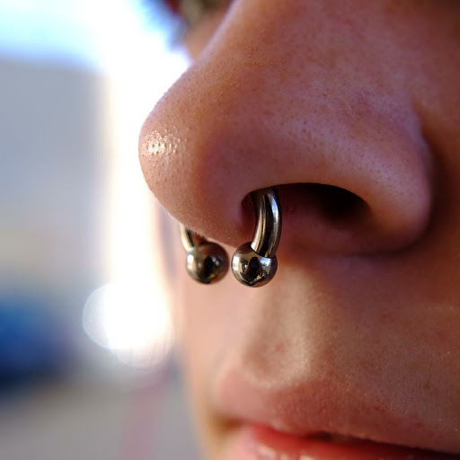 Find harley quinn tattoo ideas for your next unique tattoo in Reno at Black Hole Body Piercing