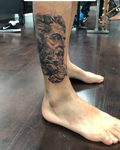 Explore anime leg tattoo ideas, creative tattoo ideas in Fontana, available at Iconiq Tattoo Studio