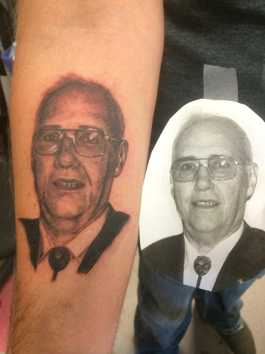 Explore tattoo flag ideas, creative tattoo ideas in Sioux Falls, available at Permanent Addictions