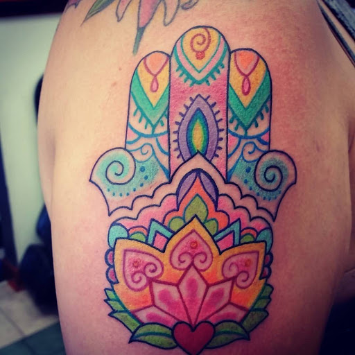 Explore pennywise tattoo ideas, creative tattoo ideas in Hampton, available at Blue Horseshoe Tattoo and Body Piercing