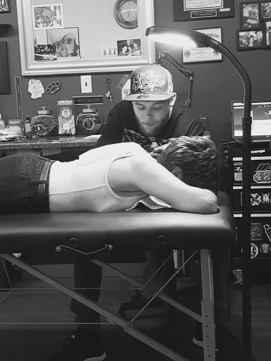 Explore hand tattoos ideas for men, creative tattoo ideas in Roscoe, available at Elevated Ink Tattoo