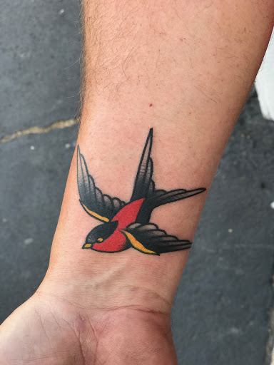 Explore 2 dog tattoo ideas, creative tattoo ideas in Tallmadge, available at Killjoy tattoo