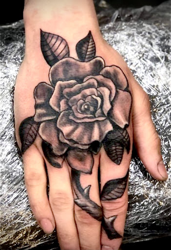 Explore dog tattoo ideas for females, creative tattoo ideas in Ottumwa, available at Family Tradition TattoosPiercings