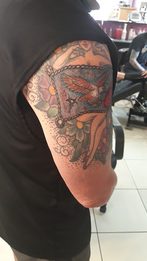 Tattoo Shop «Planet X Tattoo & Supply», reviews and photos, 3095 S Peoria St, Aurora, CO 80014, USA