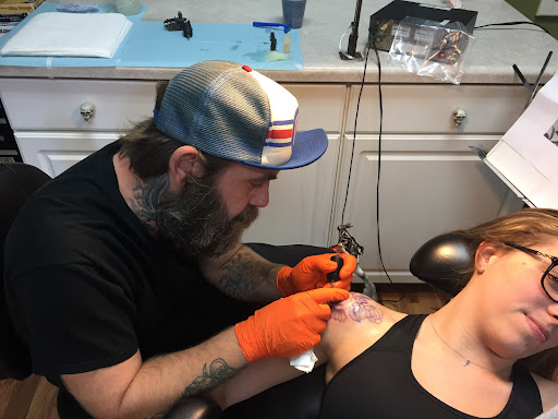 Explore live free or die tattoo ideas, creative tattoo ideas in Chicago, available at Shreds Inferno Custom Tattoos