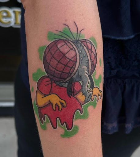 Explore watercolor tattoo ideas for females, creative tattoo ideas in Dubuque, available at Grim River Tattoo