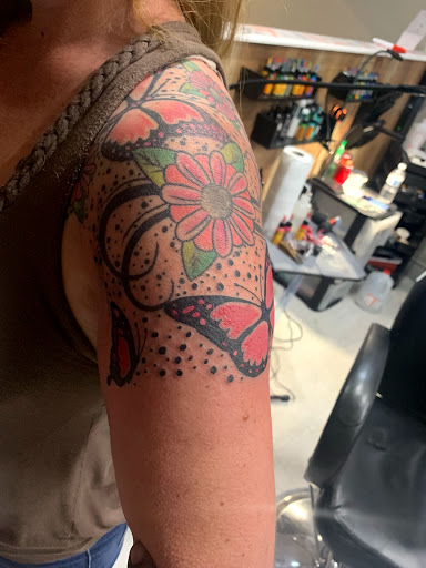 Explore butterfly arm tattoo ideas, creative tattoo ideas in Cape Coral, available at UNRIVALED INK