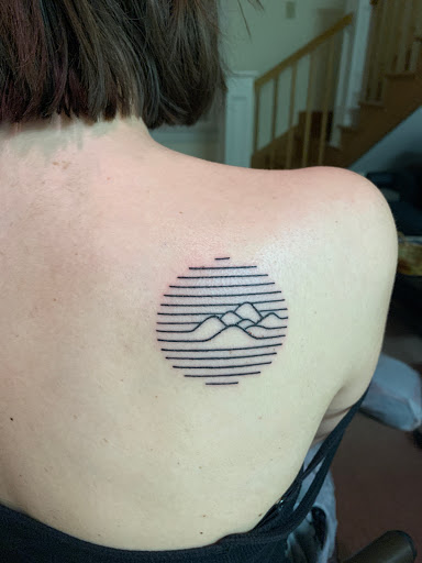 Explore cherub tattoo ideas, creative tattoo ideas in Northport, available at Cynical Tattoos Shop