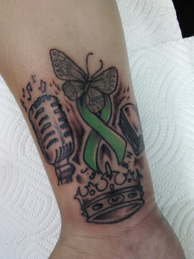 Explore full neck tattoo ideas, creative tattoo ideas in Cranston, available at Kabloom Tattoo Studio