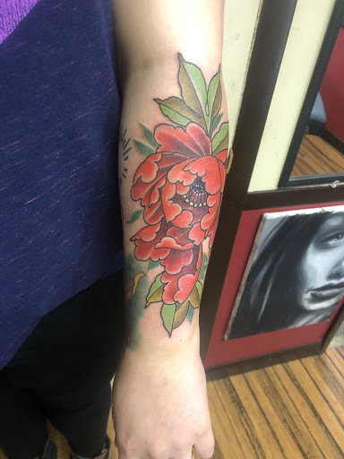 Explore butterfly leg tattoo ideas, creative tattoo ideas in Green Bay, available at Skinny Buddha Tattoo