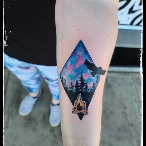 Explore time flies tattoo ideas, creative tattoo ideas in Clarkston, available at Rogue Tattoo