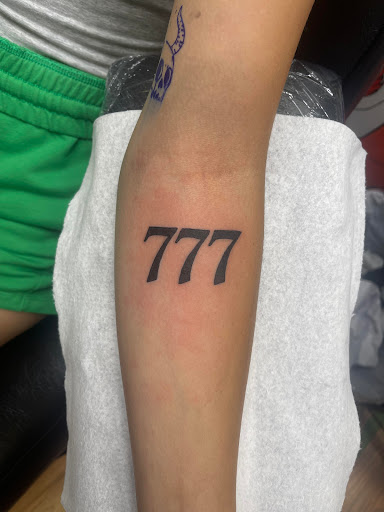 Explore cute flower tattoo ideas, creative tattoo ideas in Fort Wayne, available at drieM World Tattoos & Art Gallery