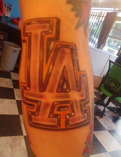 Explore fine line name tattoo ideas, creative tattoo ideas in Independence, available at Time Machine Tattoo