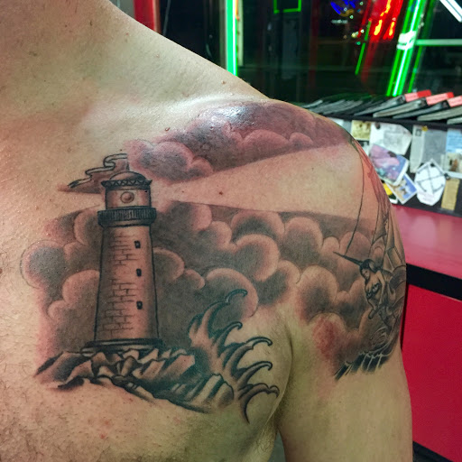 Explore abdominal tattoo ideas, creative tattoo ideas in Reno, available at Aces Tattoo