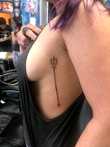 Explore tattoo ideas for a submissive, creative tattoo ideas in Aurora, available at Ronin Tattoo Studio INC