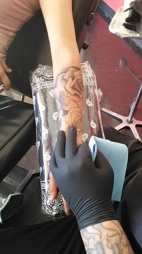 Explore small snake tattoo ideas, creative tattoo ideas in Glendale, available at Bad Intentions Tattoo, Piercing & Supply, LLC