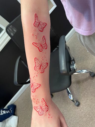 Explore small dog tattoo ideas, creative tattoo ideas in Bloomsburg, available at Tuccis Tattoo & Piercings Studio