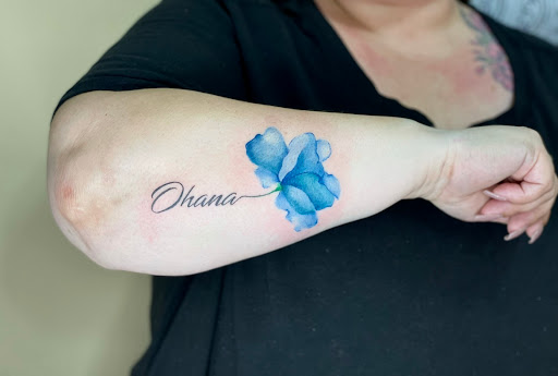 Explore cover up finger tattoo ideas, creative tattoo ideas in Clarksville, available at Dark Raine Tattoo