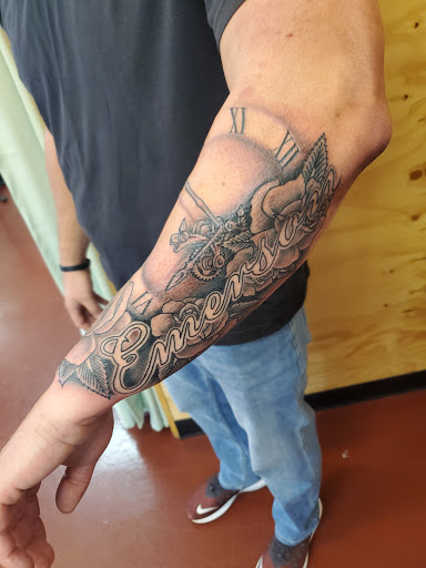 Explore male wedding ring tattoo ideas, creative tattoo ideas in State College, available at King Cobra Tattoo