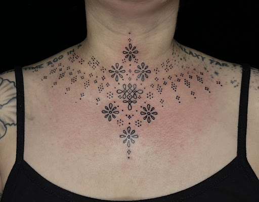 Explore cardinal tattoo ideas, creative tattoo ideas in Lander, available at Blackblood Tattoo and Piercing