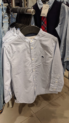 Stores to buy women's white shirts Granada
