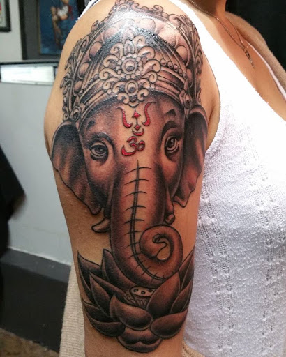 Explore cover up tattoo ideas female arm, creative tattoo ideas in Oxnard, available at Downtown Tattoo & Body Piercing