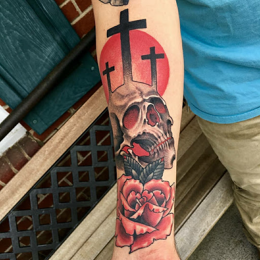 Explore small dog tattoos ideas, creative tattoo ideas in Calhoun, available at A Sailors Grave Tattoo Parlor