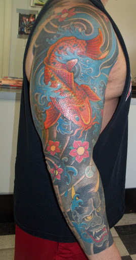 Explore arm tattoo ideas female, creative tattoo ideas in Pelham, available at Tattoo Fever