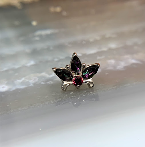 Find garter belt tattoo ideas for your next unique tattoo in Worcester at Elegance Piercing & Tattoo Inc.