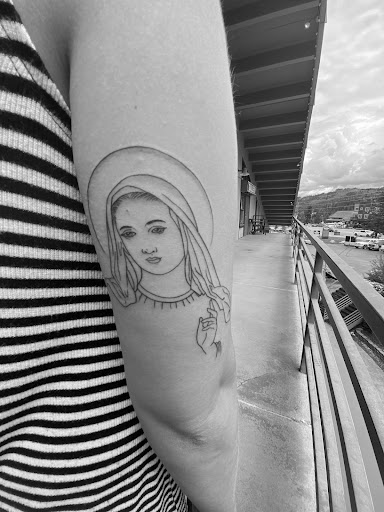 Find tattoo ideas black for your next unique tattoo in Winter Park at Overlook tattoo company