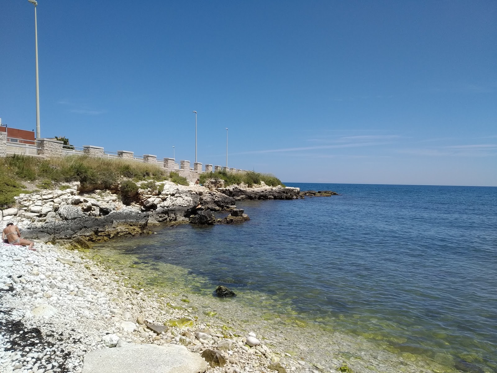 Zdjęcie Gatto Verde Beach z powierzchnią teren skalisty