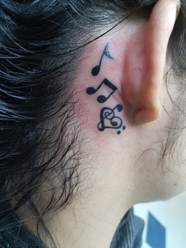 Explore rocky tattoo ideas, creative tattoo ideas in Libertyville, available at Art With Atattooed