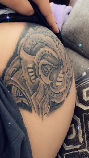 Explore tattoo ideas for female wrist, creative tattoo ideas in Roanoke, available at Black Caesar Tattoos & Piercings