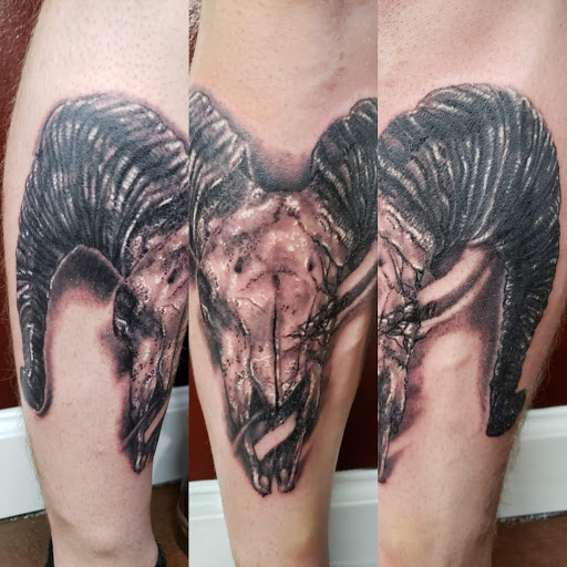 Explore gangster tattoo ideas, creative tattoo ideas in Mebane, available at The Cardinal Skin Art & Gallery