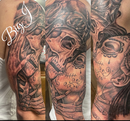 Explore fist bump tattoo ideas, creative tattoo ideas in Watervliet, available at Vivid Arts