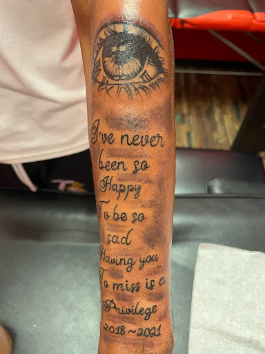 Explore rip dad tattoo ideas, creative tattoo ideas in Mobile, available at Brothers Ink Tattoo Parlor