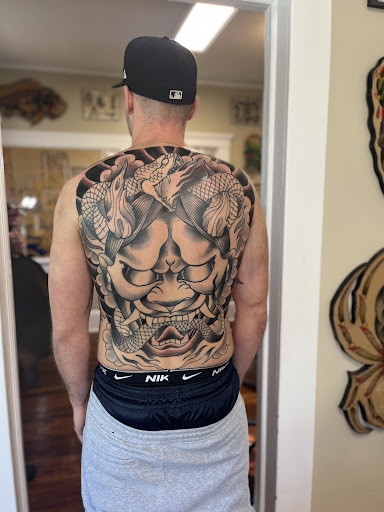 Find dragon arm tattoo ideas for your next unique tattoo in North Charleston at Blu Gorilla Tattoo