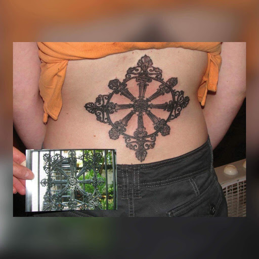 Explore apple tattoo ideas, creative tattoo ideas in Savannah, available at Tatlyfe Studios