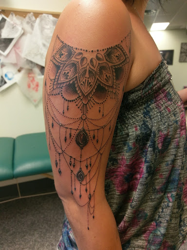 Find tattoo ideas music notes for your next unique tattoo in Saint Paul at Iron Rhino Tattoo