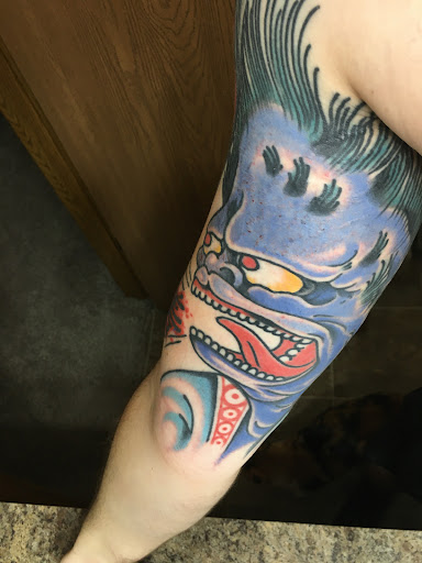 Explore colored tattoo sleeve ideas, creative tattoo ideas in Grand Rapids, available at Meeting house tattoo