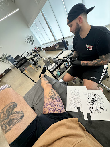 Explore pink ribbon tattoo ideas, creative tattoo ideas in Hutto, available at Upside Tattoo