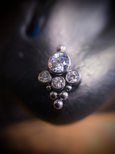 Explore slytherin tattoo ideas, creative tattoo ideas in Springfield, available at Body Piercing By Qui Qui