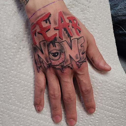 Explore upper back tattoo ideas male, creative tattoo ideas in Cumberland, available at Queen City Ink