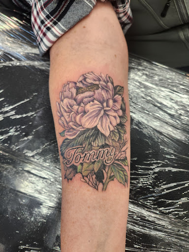 Explore tattoo father daughter ideas, creative tattoo ideas in Helena, available at Legacy Ink