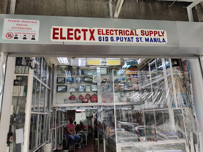 Storefront of "ELECTX Electrical Supply" at 619 G. Puyat St., Manila. The entrance has clear plastic sheets and shelves filled with electrical products. A sign instructs to maintain social distancing. Items are visible through the window and a person is seated inside.