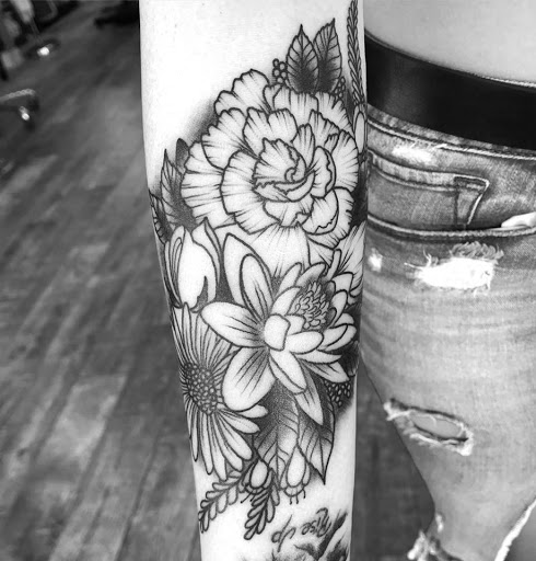 Explore cake tattoo ideas, creative tattoo ideas in Lakeland, available at Black Swan Tattoo