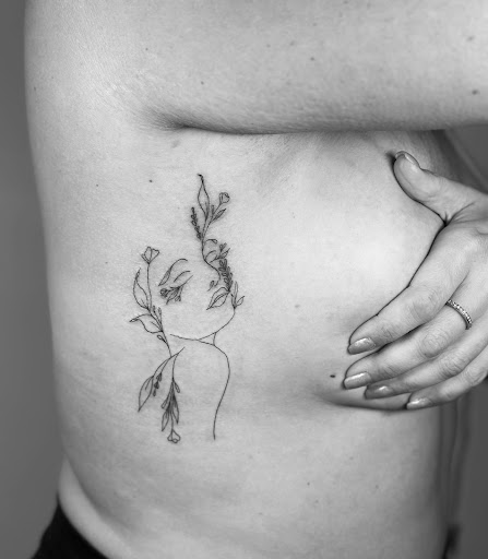 Explore fern tattoo ideas, creative tattoo ideas in New Philadelphia, available at Divine Ink Studio