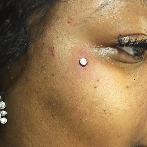 Find under breast tattoo ideas for your next unique tattoo in Summerville at Exotic Impressions Body Piercing